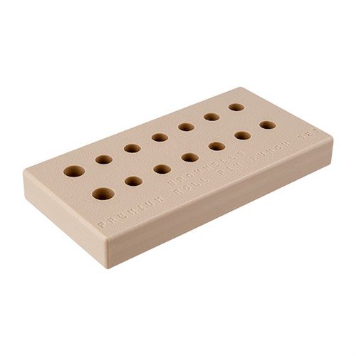 Delrin bench block with 14 holes to securely hold your Brownells premium roll pin sets, ensuring organized and efficient gunsmithing. Dimensions: 6.125