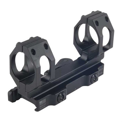 Robust 30mm scope mount with quick-detach system, ensures secure fit on Picatinny/Weaver rails, easy removal, and superior stability under heavy recoil.