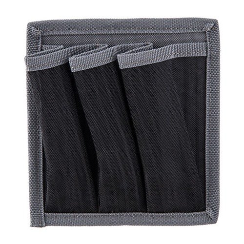 UNIVERSAL MAGAZINE HOLDER offers versatile Hook and Loop or magnetic backing for secure storage in carpeted or metal safes, ideal for common shooting accessories.