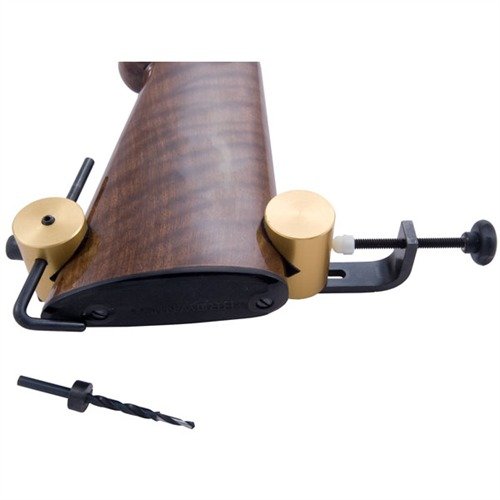 SLING SWIVEL DRILL JIG ensures precise drill alignment for rear swivel stud holes, fits all stocks, prevents marring, and includes a special drill bit for clean holes.