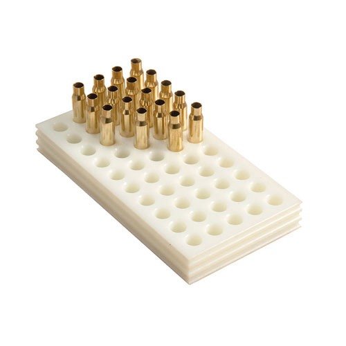 Heavy-duty, easy-to-clean loading blocks made from solid white polyethylene, featuring finger grooves and chamfered holes for secure case handling.